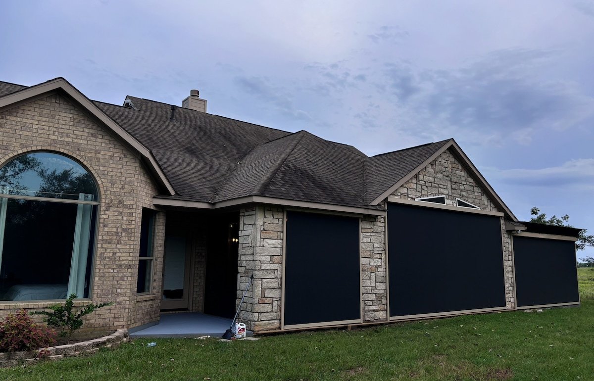 Covered backyard with automated screen doors