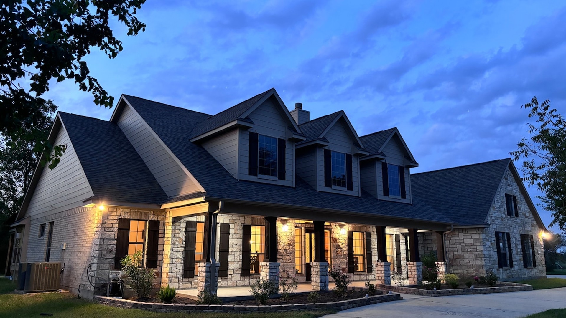 Aerial view of a luxury Texas ranch at golden sunset