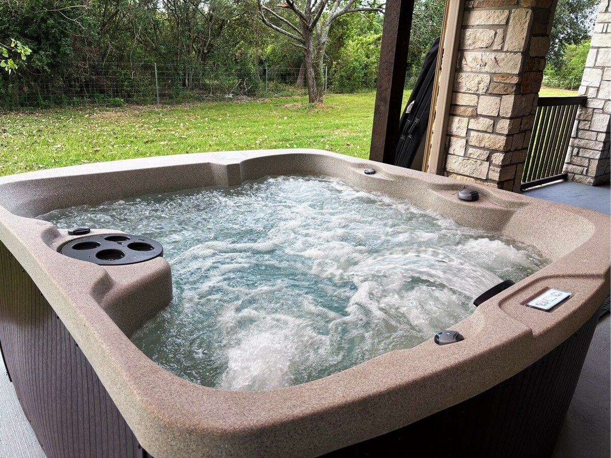 6-person hot tub with waterfall and color lighting